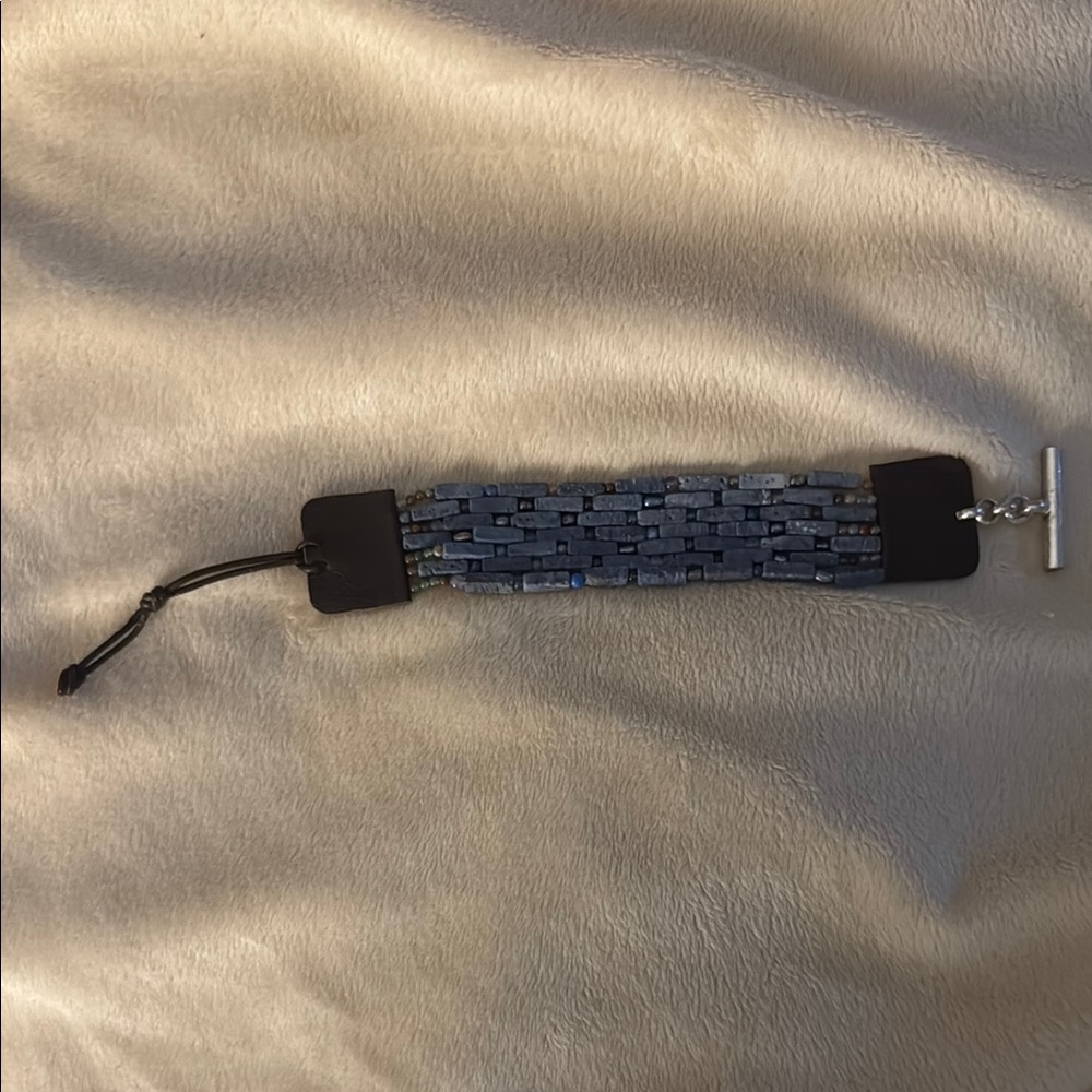 Kenneth Cole Blue Beaded and faux, brown leather toggle Bracelet